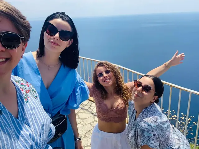Friends posing at a viewpoint on Capri