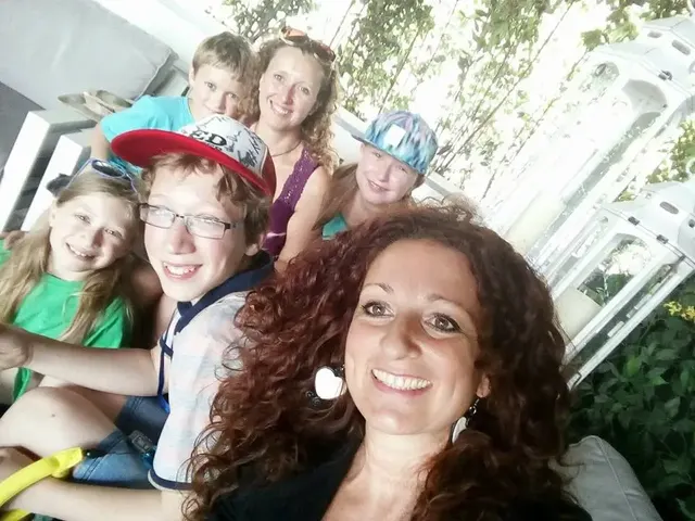 Family with children on the boat